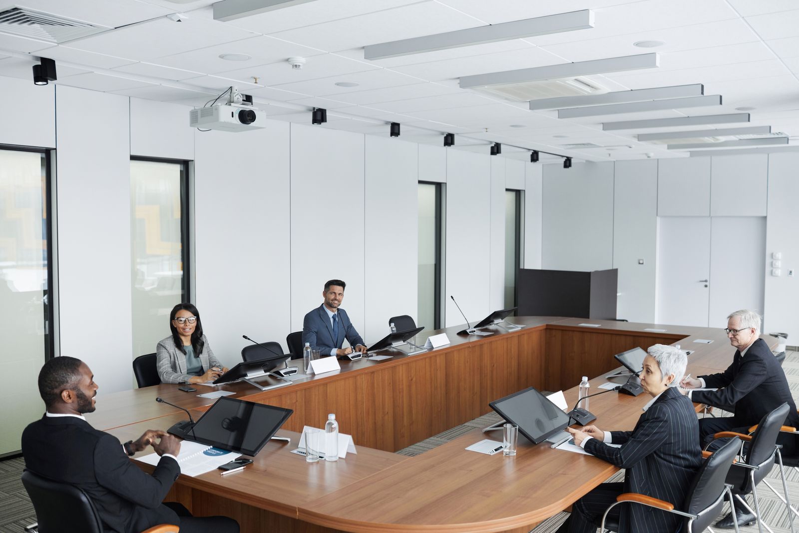 Directors and board members in a boardroom discussion